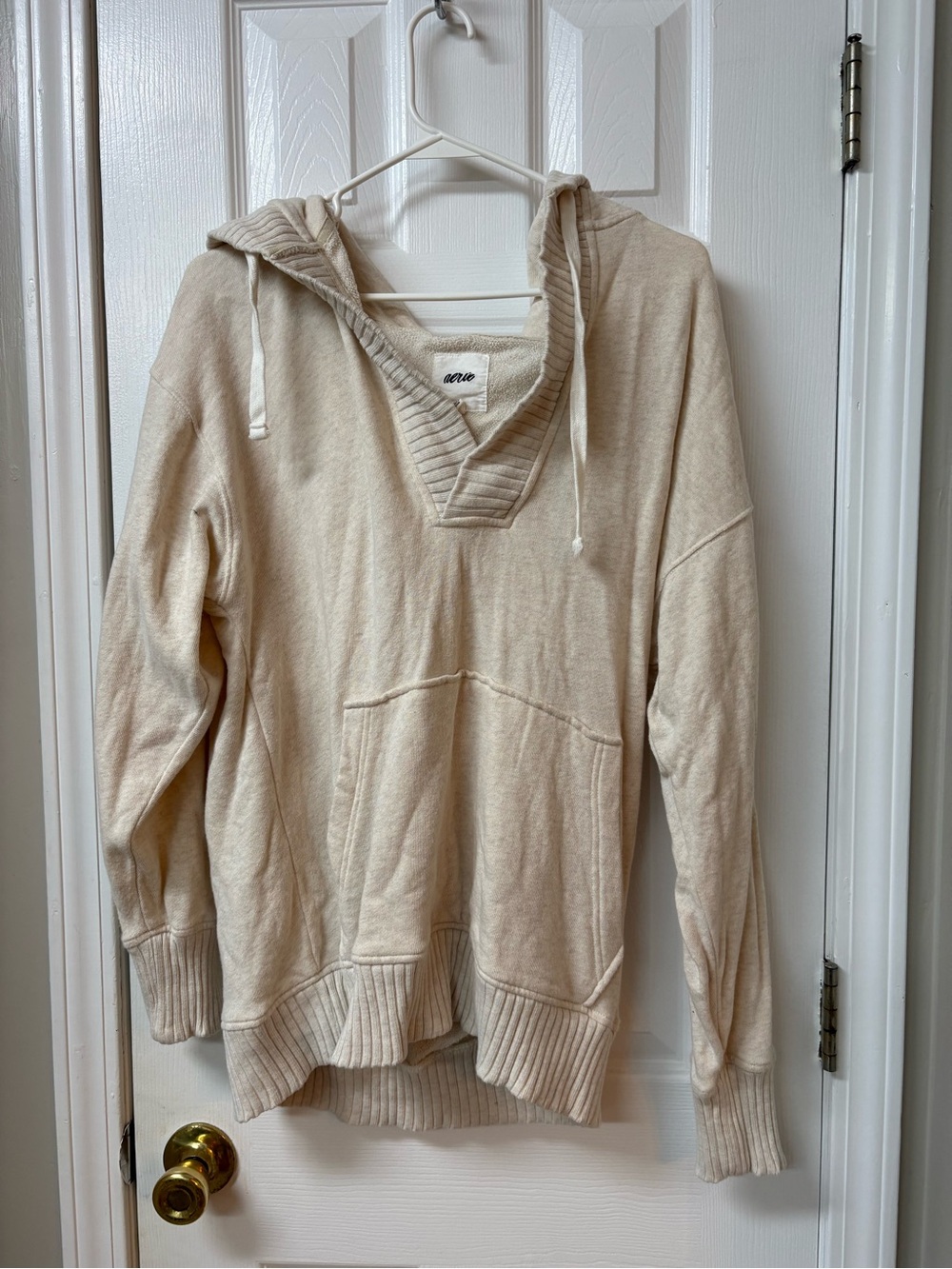 American Eagle Outfitters Cream Hoodie with Black Script Logo